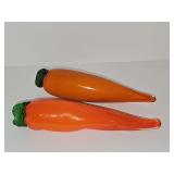 Two Murano-style blown art glass carrots.