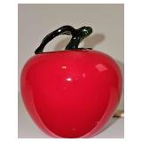 Murano-style blown art glass red ripe apple with stem and leaf. 3.75 in tall. Color differentiation is shadowing. Color is an even apple red.