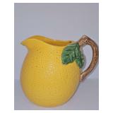 Lemon pouring pitcher. 7 in tall including handle.