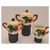 Franciscan Fresh Fruit earthenware creamer and two covered sugar bowls.