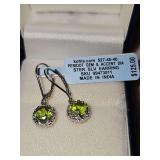 Sterling silver earrings with peridot gemstone and accent diamond chips. New with tags.