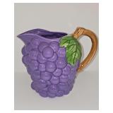 Grape  pouring pitcher. 7.5 in tall, with leaf and Vine for handle