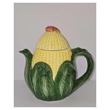 Decorative corn teapot with a beetle on the lid. 7.25 in tall