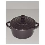 Le Creuset Stoneware Mini Round Cocotte in a deep fig purple. 4x3.5 in tall including lid.