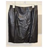 Jaclyn Smith black leather side zip skirt in size 16. 23.5 in long. Very good condition.