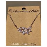Amanda Blu CZ necklace. According to their website all of their jewelry is gold-dipped or sterling silver-dipped with added palladium layers to protect the finish.