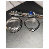 For sterling silver rings weighing a total of 7.5 g. Sizes range from 5-6 1/2.