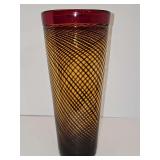 Beautiful handcrafted vase with red rim on top with amber and gray color swirls on body of vase. 11.25 in tall.