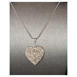 Sterling Silver heart pendant on sterling silver 19 inch rope chain. 15.0 g