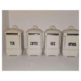 Four porcelain canister set for tea, coffee, rice, and oatmeal. Made in Czechoslovakia during the early-to-mid 20th century. 4x4x8-in tall.