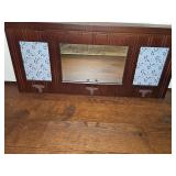 Wall hanging decorative photo holder with long horn steer hooks. All frames can be replaced with photos or other color coordinated decorative papers of your choice. Center frame is a mirror. 22.5 x 10