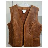 Coldwater Creek embossed leather vest with two front pockets. Size medium in very good condition.