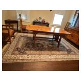 Silk Collection area rug in primary colors of green ivory black and burgundy. Includes underpad. 99 x 128 in