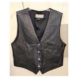 Street Wear Cardle Little black leather button front vest with two front pockets. Size large in very good condition.