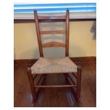 Vintage ladder back child’s rocker with rush seating - 18-1/2 x 13 x 14-1/2 to seat (32 tall overall)