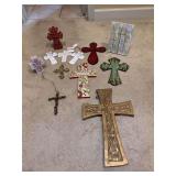 Grouping of crosses of various size and material