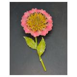 Lovely enamel flower brooch featuring pink outer petals and a textured yellow center