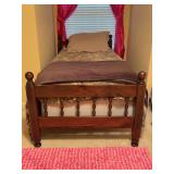 Classic wood twin size bed with rich brown finish and spindle-style headboard and footboard - includes all bedding and mattresses - MUST TAKE ALL