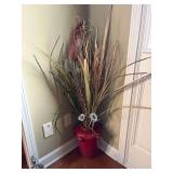 Very nice artificials in burgundy floor vase
