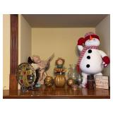 Home decor grouping on fireplace mantle