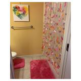 Very cute selection of bathroom decor - pink chenille-style rug, matching bath and toilet nets, plastic butterfly shower curtain and heart-shaped butterfly oil on canvas