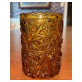 Early American Pressed Glass (EAPG) amber glass piece featuring the classic Daisy and Button with Vandyke pattern - 4-3/4” tall