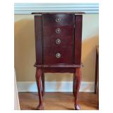 Freestanding traditional dark mahogany/cherry wood jewelry armoire with a lift-top lid with interior mirror, side-swing necklace doors & four lower pull-out drawers - Queen Anne-style with cabriole le