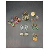 Nice grouping of costume jewelry- clip-on earrings, pendants, brooches