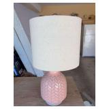 Pink ceramic table lamp with a geometric herringbone or chevron pattern and a cylindrical off-white fabric drum shade - 18” tall