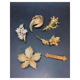 Beautiful selection of gold-tone brooches