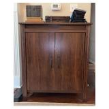 Dark wood finish double door cabinet - great for electronics, books, etc……right front support needs bumped back into place - 31-1/2 x 18-3/4 x 37 tall