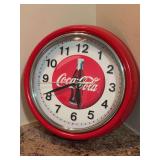 Licensed metal framed Coca-Cola Collector Clock - needs batteries - tiny spot of corrosion where battery previously was - 9-1/2”D