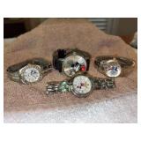 Grouping of (3) Disney Mickey Mouse watches and (1) Minnie Mouse watch