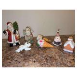 Grouping of (7) adorable ceramic/porcelain ornaments - tall Santa on left is by ENESCO