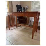 wooden Mission or Arts and Crafts style writing desk featuring slatted side panels and (3) front drawers and drop down center - 47-1/4 x 22 x 30-1/2 tall