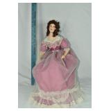 TC 1999 16" doll with wicker chair; as is