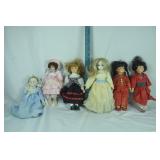 6 assorted dolls; as is
