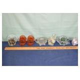 7 figural glass votive candle holders; as is