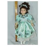 The Brass Key, Inc. 17" porcelain doll; as is
