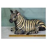 Ceramic recumbent zebra figure, 18" long; as is