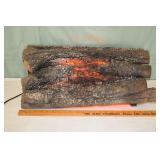 Electric glowing fire log; as is