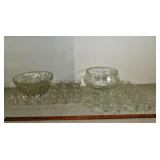 2 clear glass punch bowls, 35 cups and one plastis