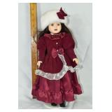 The Brass Key, Inc. 16" porcelain doll; as is