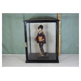 Japanese doll 15" in a display case; as is
