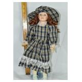 NJSF 16" porcelain doll; as is