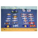27 Art glass objects: 24 candies, 2 animals, bicyc