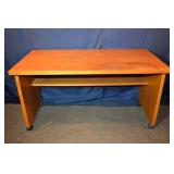 MCM teak finish rolling work table, 48x24x26"h; as