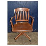 Walnut finish Boling Chair Co. swivel rocking offi
