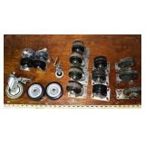 18 assorted caster wheels; as is