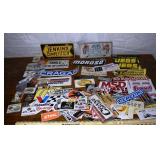 Large collection of automotive stickers, car show
